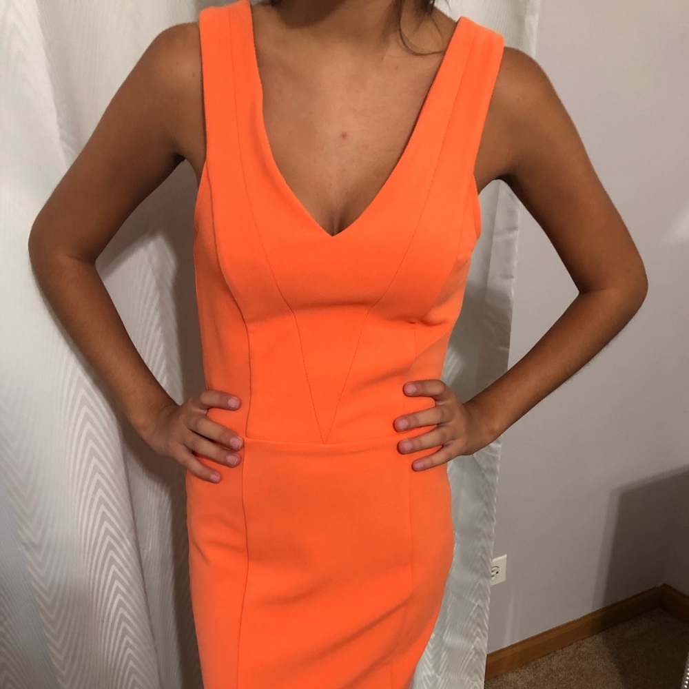 Kim Kardashian Burnt orange fitted dress